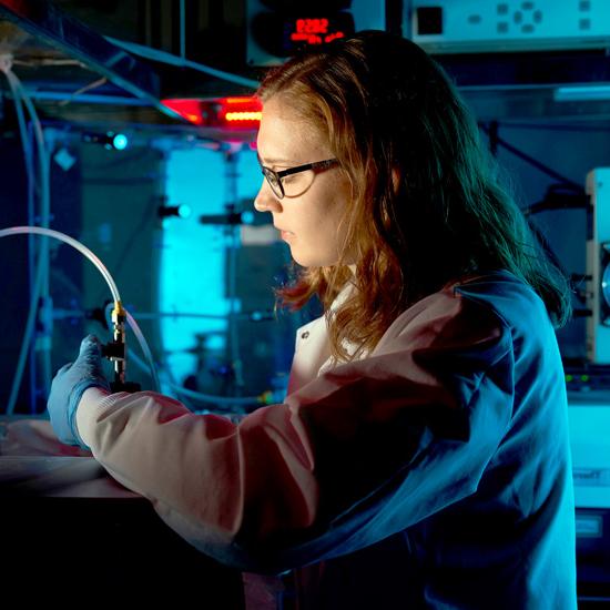 Heather Ricker, a Skidmore college student, conducts an experiment in a chemistry lab